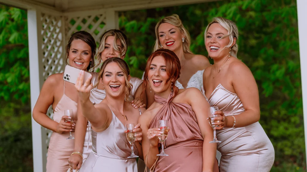 Glamorous bridal party taking a selfie - bridal party makeup in Dublin by Nima