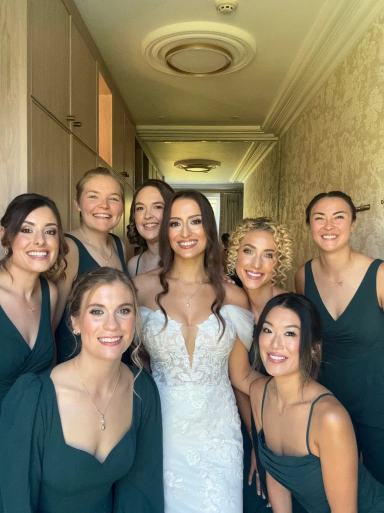 Bride surrounded by her bridesmaids - bridal party makeup by Nima
