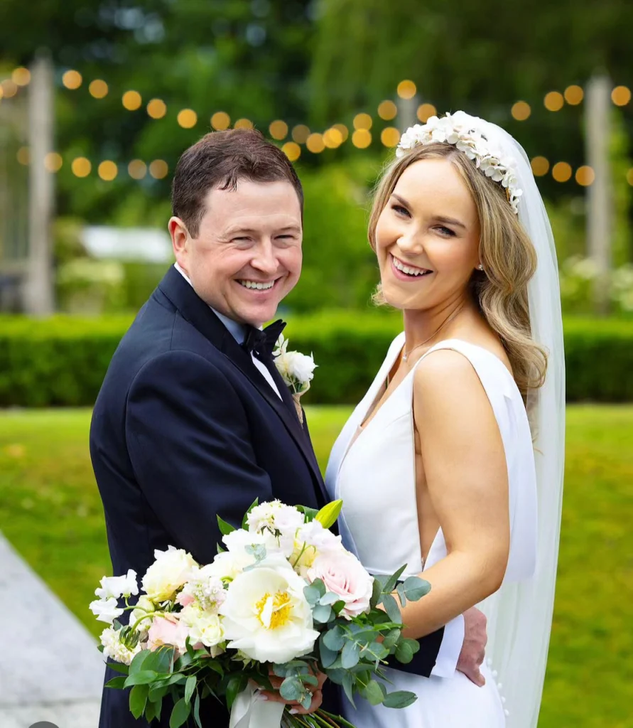 Smiling bride and groom on their wedding day in Ireland