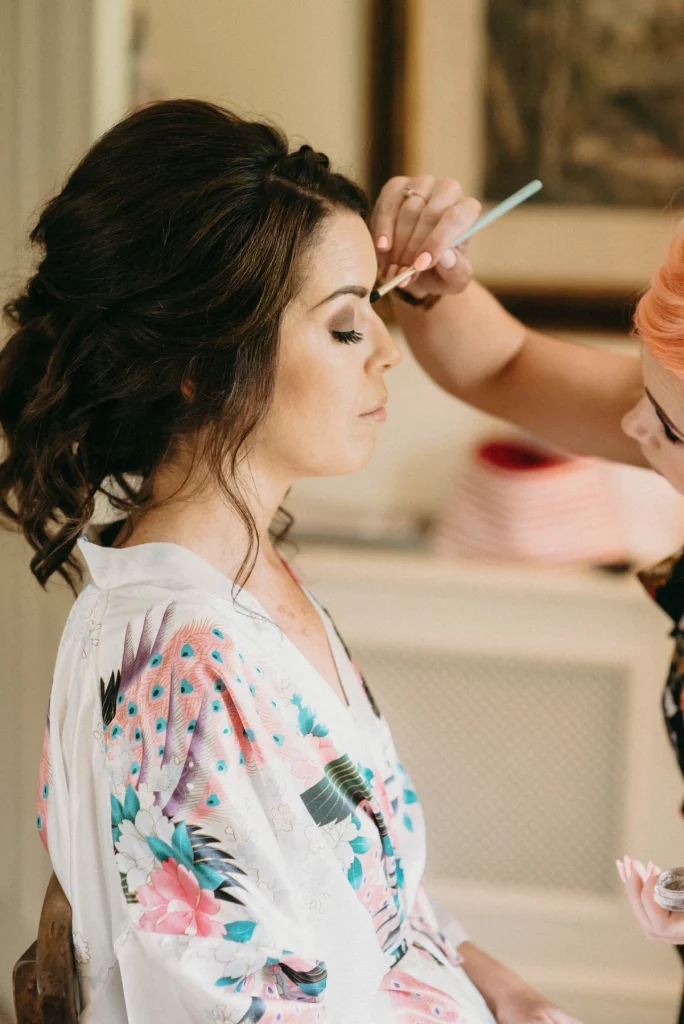 Nima creating an elegant bridal makeup look