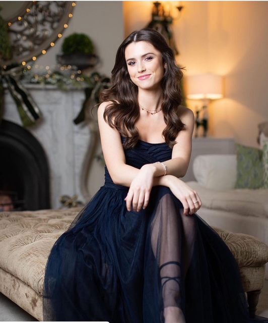 Occasion makeup done for gorgeous brunette woman in a black dress