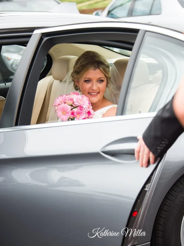 Blonde bride getting into her car